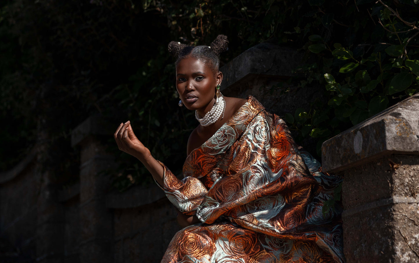 Malika Bubu Dress styled loose, showing its oversized silhouette and metallic floral brocade.