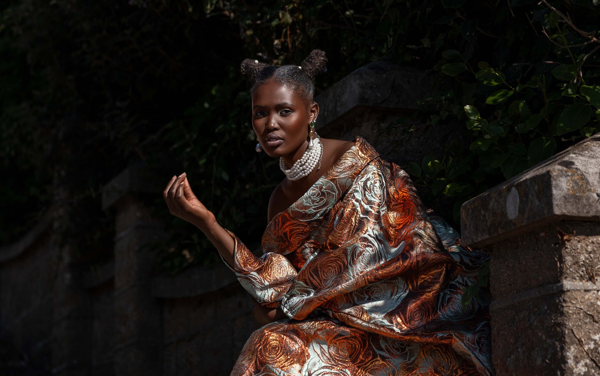 Malika Bubu Dress styled loose, showing its oversized silhouette and metallic floral brocade.